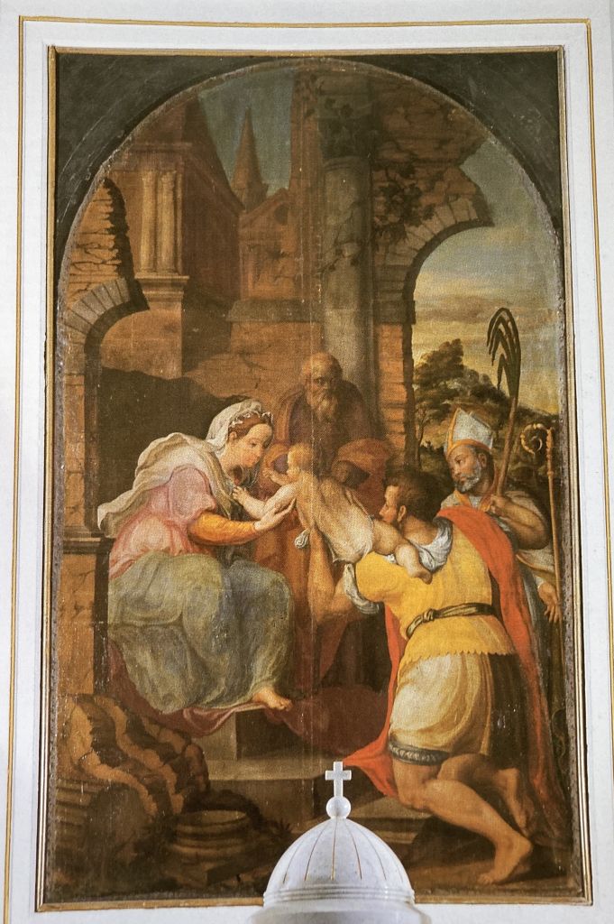 San Cristoforo porge il Bambino alla Madonna