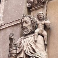Busto del santo con Bambino di stucco